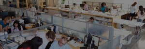 image of office with people working at desks