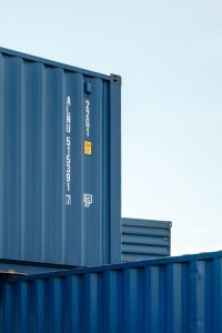 cropped view of blue shipping containers
